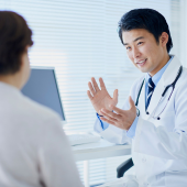 doctor talking to patient