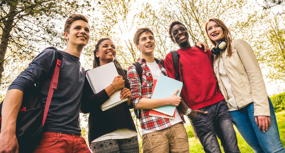 Five teens, smiling