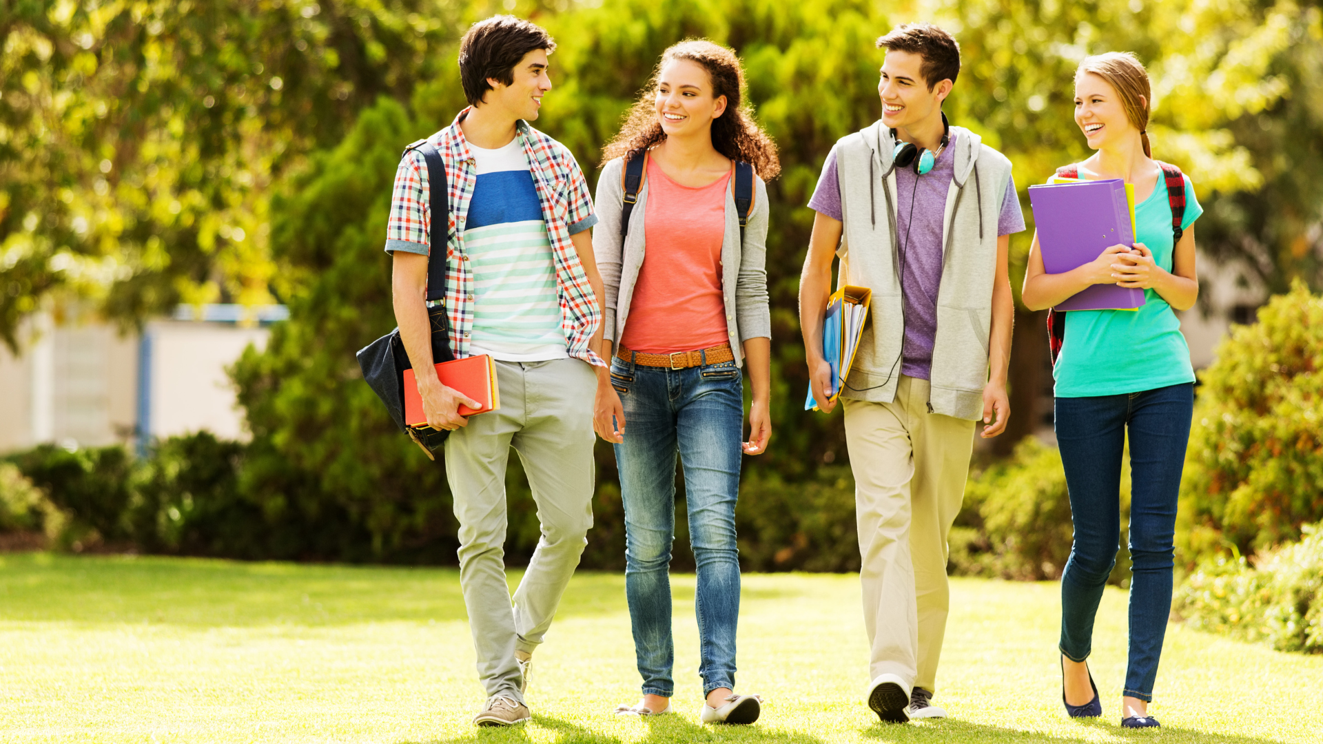 Students walking on lawn